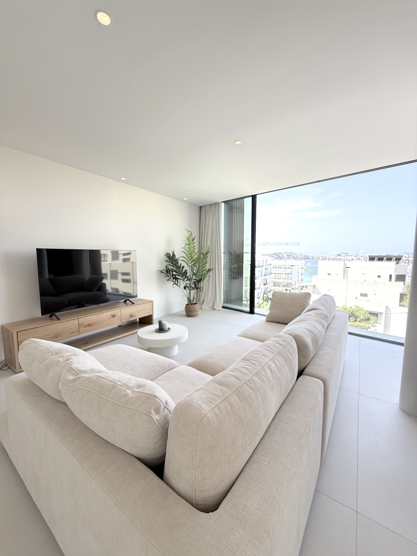 Resa Estates Ibiza longterm rent Talamanca penthouse living tv .jpeg